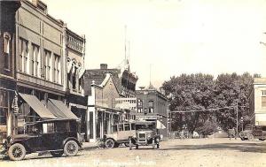 Montezuma IA Storefronts Chevrolet Dealership Old Cars RPPC Postcard