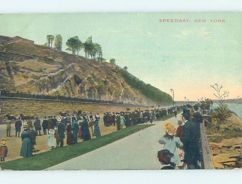 Divided-Back PEOPLE LINING THE SPEEDWAY TO WATCH HORSES GO BY New York NY i1631