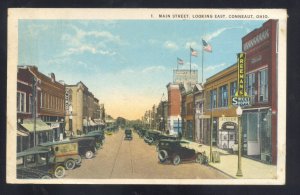 CONNEAUT OHIO DOWNTOWN MAIN STREET SCENE OLD CARS STORES VINTAGE POSTCARD