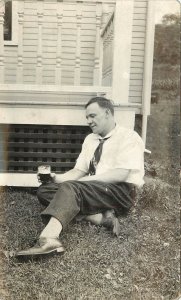 RPPC; Happy Man with a Beer, Resting on the Grass, Posted Akron OH 1916