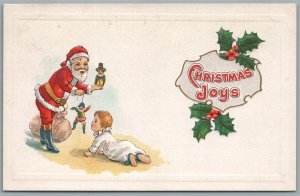 SANTA w/ PUPPET TOY CHRISTMAS JOYS ANTIQUE POSTCARD w/ PRINTER'S ADVERTISING