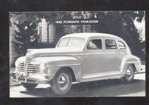 1942 PLYMOUTH FOUR DOOR STORM LAKE IOWA CAR DEALER ADVERTISING POSTCARD