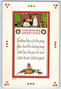 Christmas Postcard Greetings Children Hanging Stockings Fireplace Embossed 1914