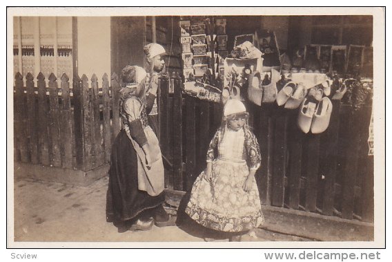 RP: Eiland Marken girls look at postcards , Netherlands , 20-40s