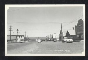 RPPC MCARTHUR CALIFRNIA DOWNTOWN STREET SCENE OLD CARS REAL PHOTO POSTCARD