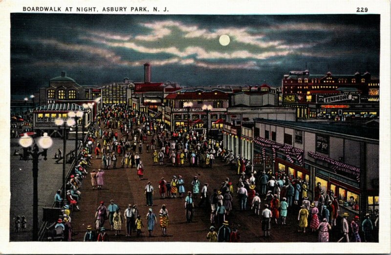 Postcard NJ Asbury Park Boardwalk at Night Crowds Street Lamps C.1920 M36