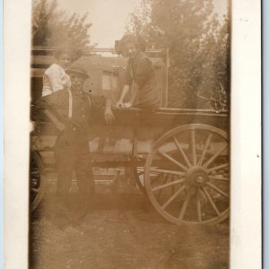 c1910s Outdoor Girls on Farm RPPC Wood Wheels Hay Rack Man Suspenders Photo A212