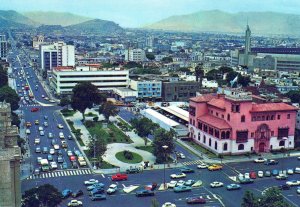 VINTAGE CONTINENTAL SIZE POSTCARD AERIAL VIEW OF 28th OF JULY AVENUE LIMA PERU