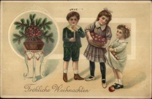 German Christmas Children w/ Basket of Fruit c1910 Embossed Postcard
