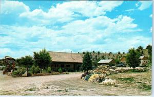 ORDERVILLE, UT ~ Roadside FISHER'S RANCHO LODGE Trailer Park Rock Shop Postcard