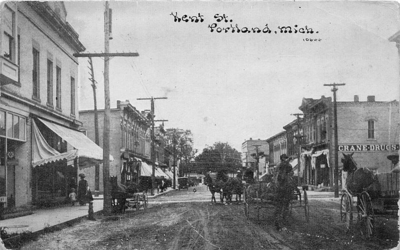 F70/ Portland Michigan Postcard c1910 Kent Street Crane Drug Store