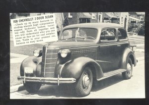 1938 CHEVROLET 2 DOOR SEDAN SUMNER IOWA CAR DEALER ADVERTISING POSTCARD CHEVY