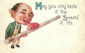 Artist impression Man licking peppermint Stick Sweet Life C-1910 Postcard 968