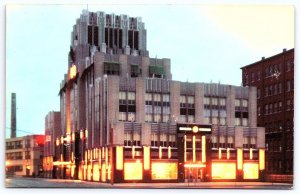 The Syracuse Lighting Company Office Building At Night New York NY Postcard