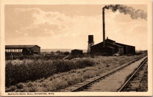 Alfalfa Meal Mill Riverton Wyoming Postcard railroad tracks, stack, water tower