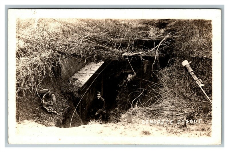 RPPC WWI Soldier In Grass Covered Concrete Dugout Bunker Real Photo Postcard