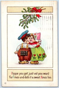 1913 Christmas Dutch Kids Kissing Under Mistletoe Embossed New York NY Postcard