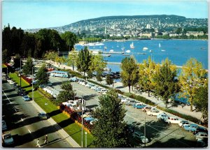 CONTINENTAL SIZE POSTCARD PNAORAMIC VIEW OF LAKE AREA OF ZURICH SWITERLAND