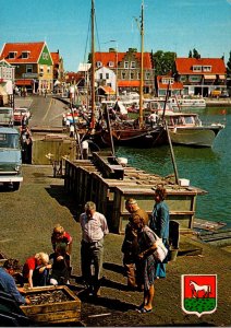 Netherlands Volendam Dock Scene People Looking At Fish