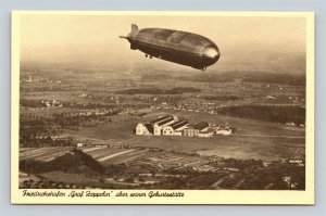 Graf Zeppelin LZ-127 Over Friedrichshafen Germany 1970's Reissue Postcard