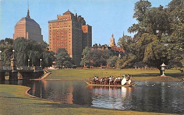 Swan Boats & Back Bay Skyline in Boston, Massachusetts from Public Garden.