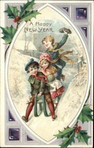 New Year Art Nouveau Children on Sled Sledding c1910 Vintage Postcard