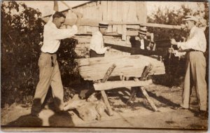 RPPC Handsome Men Sawing Wood Crosscut Saw Large Log c1910 Postcard A29