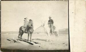 c1907 RPPC; Girl & Boy on Horseback at Homestead, Unknown North Dakota Location