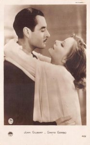 RPPC JOHN GILBERT & GRETA GARBO ACTORS REAL PHOTO POSTCARD (c. 1920s)