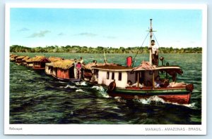 BRAZIL ~ TUGBOAT Pulling String of FISHING SHACKS ~ AMAZON c1950s Postcard