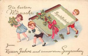 BG20316 children with big book clover new year neujahr   germany