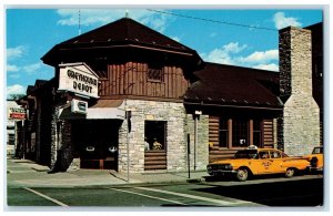 c1960 Greyhound Bus Depot Exterior Building Taxi Road Saginaw Michigan Postcard