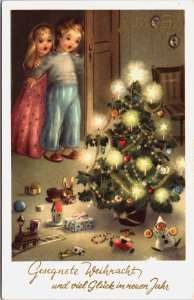 Merry Christmas Children With Looking At Toys Under Christmas Tree Postcard C176