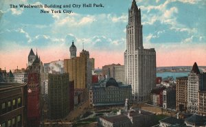 VINTAGE POSTCARD THE WOOLWORTH BUILDING AND CITY HALL PARK NEW YORK CITY