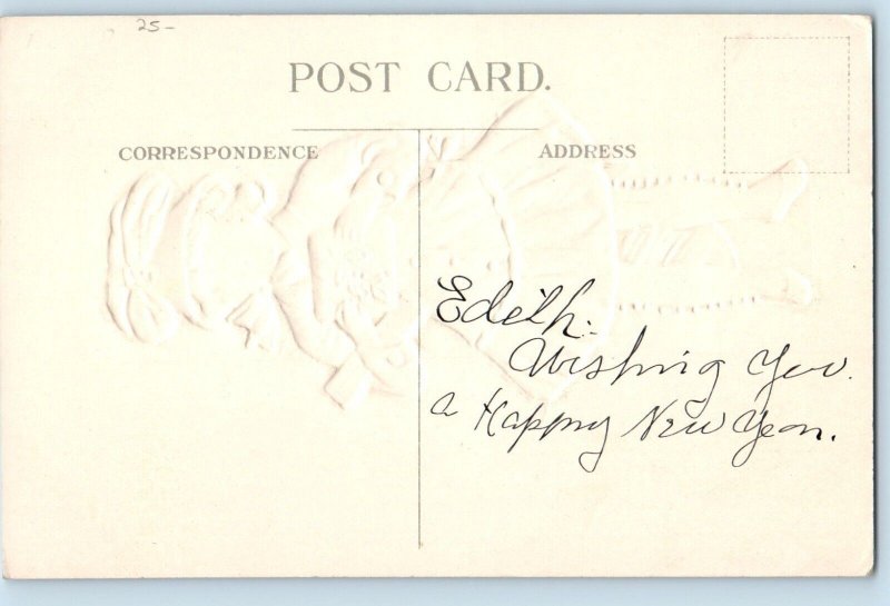 Christmas Postcard Pretty Young Girl With Gift And Candy Cane Embossed c1910's