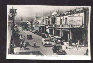 RPPC KINSTON JAMAICA DOWNTOWN STREET SCENE OLD CARS STORES REAL PHOTO POSTCARD