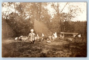 Little Girl Postcard RPPC Photo Feeding Chickens Hen On Field c1910's Antique