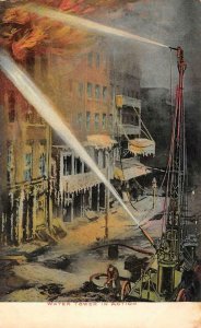 Firefighting  FIREMEN & WATER TOWER IN ACTION~Building Fire  c1910's Postcard