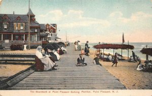 THE BOARDWALK AT POINT PLEASANT BATHING PAVILION NEW JERSEY POSTCARD (c. 1910)