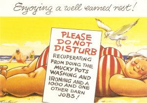 Enyoying a well eaarned rest!. Modern risque humour Bamforth postcard
