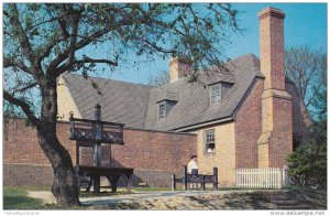 Men in Colonial Costume at Public Gaol (Jail) & Stocks, Williamsburg, Virgini...