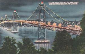 California San Francisco-Oaland Bay Bridge and San Francisco Skyline At Night