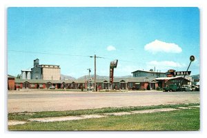 Trail Motel Soda Springs Idaho Postcard Old Cars Signs Pay Phone Booth