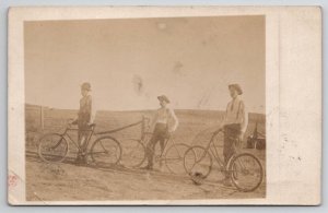 RPPC Elmore MN Three Young Boys Bicycles Larson Nelson Johnson Fam Postcard N30