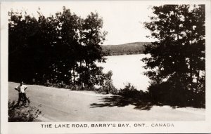 Barry's Bay Ontario The Lake Road Person on Bicycle RPPC Postcard G80 *as is