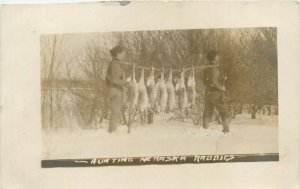 Postcard RPPC 1918 Nebraska Naper Hunting Rabbits winter scene 24-48