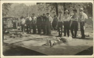 First Aid Training? Medical? Men Laying Street Stretchers Real Photo Postcard