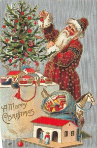 Merry Christmas Red Robed Santa Claus Tree Trimming Toys Embossed Postcard