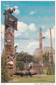 Thunderbird Park,  Empress Hotel in background,  Victoria,  B.C.,  Canada,  4...