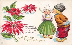 MERRY CHRISTMAS c1910 Embossed Postcard Dutch Boy & Girl Present Poinsettia